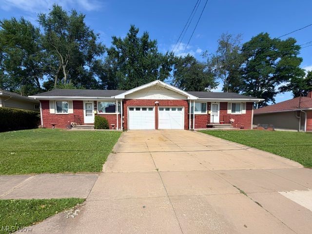 Welcome to 3330-3332 Elmwood Street, a well-maintained all-brick duplex in the heart of Cuyahoga Falls offering exceptional flexibility for owner-occupants, multi-generational living, or investors. Proudly owned and occupied by the same family, this property has not been operated as a traditional income-producing rental, reflecting true pride of ownership throughout.

Each unit offers 2 bedrooms, 1 full bath, spacious living and dining areas, hardwood flooring in the living rooms and bedrooms, an attached garage, private rear patio, and its own full unfinished basement with endless storage or future finishing potential. The basements have been professionally waterproofed, and sump pumps were installed for added peace of mind by previous owner.

The 3330 unit features a beautifully remodeled full bathroom completed with an approximately $18,000 renovation and transferable warranty. Additional major updates include furnaces replaced in 2020 and central air conditioning replaced in 2022.

Whether you're looking to live in one unit while housing family in the other, or add a quality duplex to your investment portfolio, this solid brick property offers separate living quarters, quality updates, low-maintenance construction, and an outstanding opportunity in a desirable Cuyahoga Falls location.