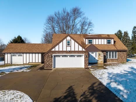 Experience refined living in the prestigious lake Harmony development with this stunning Tudor-style residence, perfectly positioned on a prime corner lot. Blending classic architectural charm with sophisticated modern updates, this four-bedroom, three-bath home offers both elegance and functionality. From the moment you enter, you’ll appreciate the expansive room sizes, thoughtfully designed layout, and seamless flow ideal for both everyday living and elevated entertaining. At the heart of the home is a beautifully appointed gourmet kitchen-a true showpiece featuring quality finishes, abundant cabinetry, and generous prep space designed for the culinary enthusiast and host a like. The oversized two-car garage, complemented by an additional 1.5-car garage, provides exceptional storage and versatility-perfect for vehicles, recreational equipment, or workshop space. Lake Harmony residents enjoy exclusive lake access, private beach privileges, swimming, fishing, and a lifestyle that feels like a year-round retreat. This is more than a home- its an opportunity to live beautifully in one of the area’s most sought-after communities.