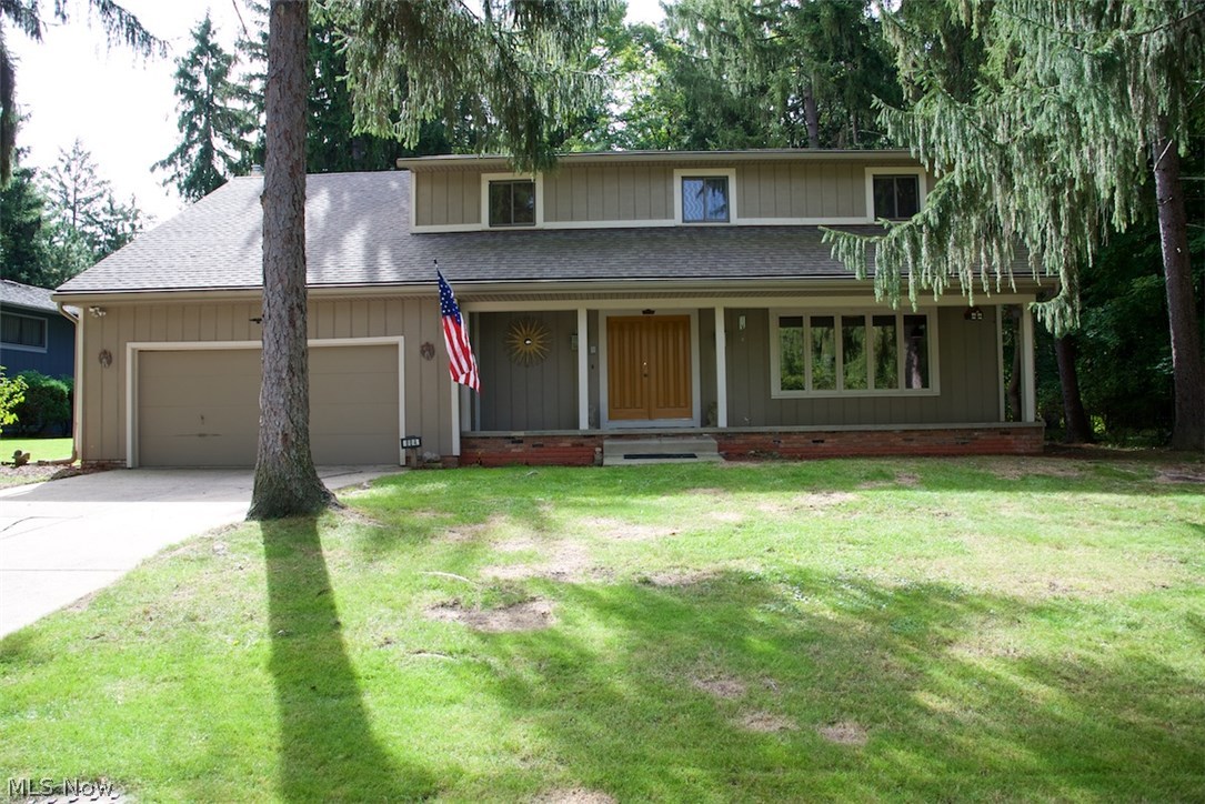 Tranquil, natural setting at this Greenwood Village colonial! Enjoy easy access to the Cuyahoga Valley National Park and all it has to offer right through your backyard, as well as all the Greenwood Village amenities including swimming pool, tennis courts, playground and more! Home features an updated eat-in kitchen with ceramic tile backsplash, newer countertops and fixtures, and island seating. Large family room with wood burning fireplace, and walkout to patio and large two-tiered deck. Formal dining room and living room. Enormous master suite with wood burning fireplace, vaulted ceilings, skylights, slider to private balcony, double closets and master bath. Four additional amply sized bedrooms. Lower level features a wine/fruit cellar, glass block windows, and workshop. Newer ceramic tile, carpet and wood blinds throughout home.  New hot water tank in ’14, window panes replaced in ’13, new roof  and exterior paint in ’09. Both fireplaces feature gas starters. All appliances include