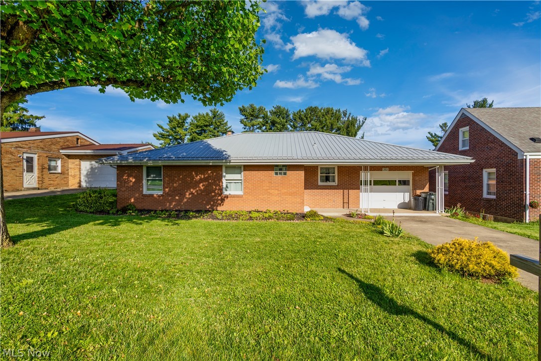 Welcome home to this charming 3-bedroom, 1-bath brick ranch situated on a spacious .21-acre lot. This well-maintained home offers timeless character and comfortable one-level living.

Step inside to find original hardwood floors that add warmth and charm throughout much of the home. The inviting living room features a cozy fireplace, perfect for relaxing evenings or gathering with family and friends.

The property also includes a convenient 1-car garage and a manageable yard with plenty of space for outdoor enjoyment, gardening, or entertaining.

With its solid brick construction, classic ranch-style layout, and desirable features, this home is full of potential and ready for its next owner to make it their own.

Schedule your private showing today!