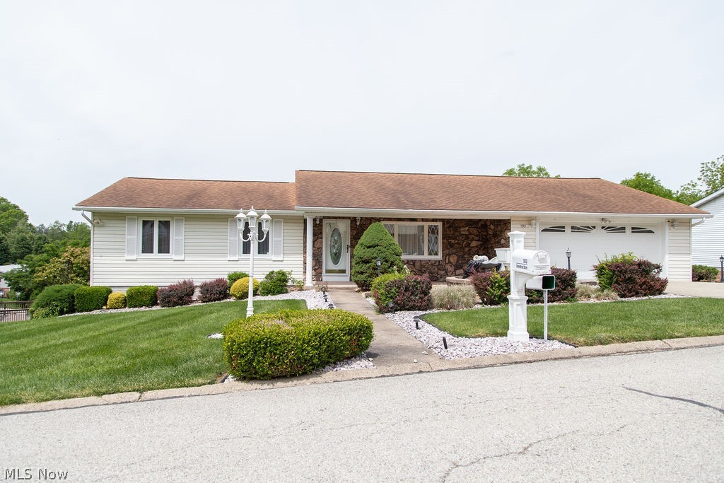 Welcome to this clean, well-maintained ranch home located in a highly desirable neighborhood! Offering plenty of space for comfortable living and entertaining, this home features 3 bedrooms and 2 full baths on the main floor, plus an additional 2 bedrooms and a full bath in the finished lower level.

The inviting family room showcases a cozy wood-burning fireplace and beautiful French doors that open to a covered deck, perfect for relaxing or hosting guests. The bright and spacious kitchen features custom cabinetry, hardwood floors, abundant natural light, and includes all appliances. A formal living room on the main floor and a large rec room downstairs provide multiple living and entertaining areas for everyone to enjoy.
Additional highlights include a large storage room, dedicated workshop space, and a private deck accessible from the primary bedroom — the perfect retreat to enjoy your morning coffee or unwind in the evening. This move-in ready home combines comfort, functionality, and charm in an ideal location! Call today for your private showing!