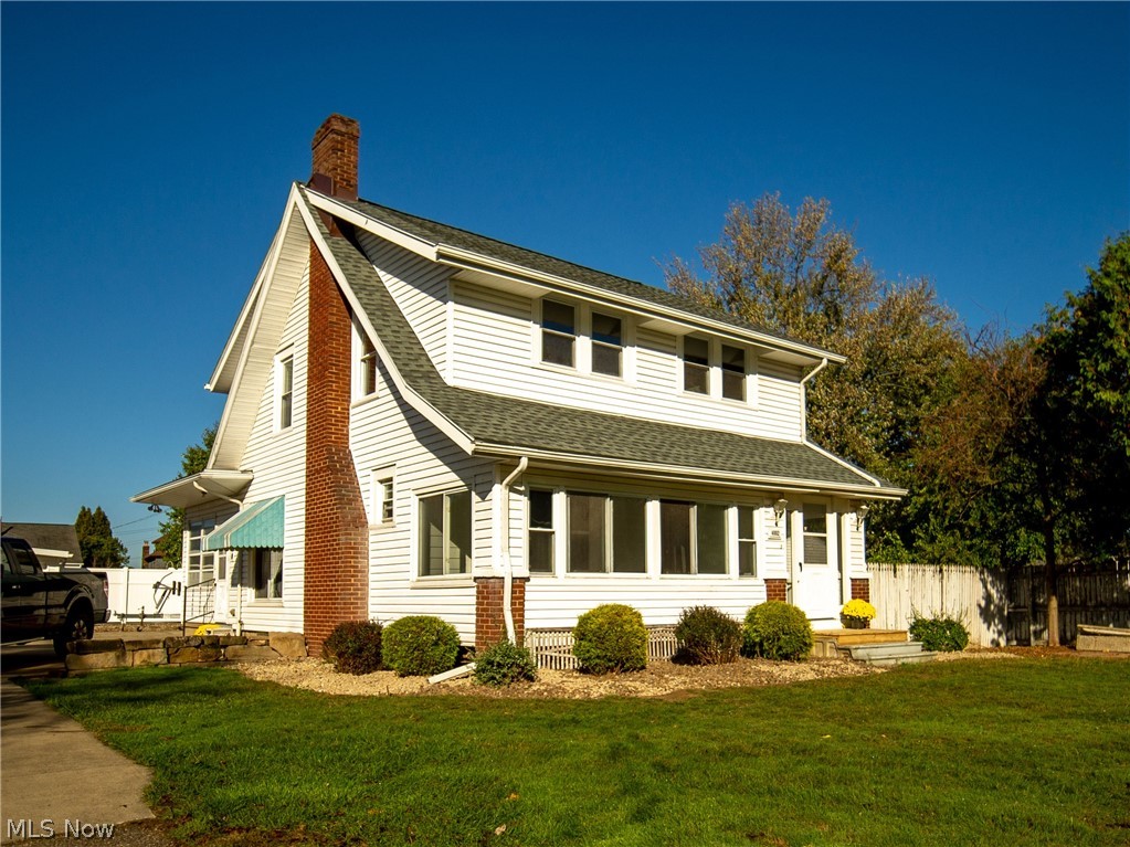 Don't miss this fabulous opportunity to get on the Portage Lakes at an affordable price! This nicely-maintained craftsman style colonial has been renovated throughout in 2019 with new flooring and paint, all while preserving the original wood trim and built-in cabinetry. Just off the kitchen full of quality oak cabinets there is a first floor laundry room. A sunny enclosed front porch with slider windows provides the perfect sitting room, while the living room features a cozy wood-burning fireplace. New roofs were put on the house and both garages in 2019. The full basement includes a newer hot water tank (2019), water softener, and additional laundry hook ups.

Beat the summer heat in the inground swimming pool with diving board and slide, and utilize the convenient pool/pump house that includes a restroom. A vinyl privacy fence ensures your safety and enjoyment. There are two garages on this property. The first is a 20x30 pole barn with a 10ft garage door (perfect for boat or RV storage), with doors on the front and back to allow for driving through. The second garage measures 20x20 and is insulated with 220 amp service and plenty of storage. Parking space is abundant in the paved driveway.

The highlight of this property is a private dock on the east shore of Turkeyfoot Lake about 400 m away. Members of the commons association enjoy their assigned docks, lake access and a beach/picnic area.