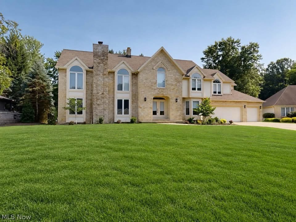 Welcome to this exceptional, fully updated luxury residence nestled on a quiet cul-de-sac in Highland Heights. Offering more than 4,000 square feet of finished living space, this impressive home features five spacious bedrooms and five full bathrooms designed for today's lifestyle.

Step inside to discover luxury vinyl plank flooring throughout the main level and a thoughtfully designed floor plan that blends elegance with everyday comfort. The stunning chef's kitchen features gorgeous quartzite countertops, custom cabinetry, a stylish tile backsplash, premium stainless steel appliances, and an exceptionally large island that opens seamlessly to the inviting family room. Anchored by a striking floor-to-ceiling stone gas fireplace, this space is ideal for entertaining and relaxing. Just off the family room, a private home office is perfect for working remotely or studying.

The formal dining room showcases a tray ceiling and beautiful bay window, creating an elegant space for hosting holidays and special occasions, while the formal living room offers an area to gather or unwind. A full bathroom on the main level adds convenience for guests.

Upstairs, the luxurious owner's suite offers a peaceful retreat with a beautifully renovated spa-inspired bathroom featuring upscale finishes and a spacious walk-in closet. Four additional generously sized bedrooms provide plenty of room for family and guests, complemented by two well-appointed full bathrooms with double vanities. A second-floor laundry room adds everyday convenience.

The finished lower level expands the home's living space with an oversized recreation room, perfect for movie nights, game days, or entertaining. A fifth full bathroom makes this level ideal for overnight guests or extended family.

Enjoy outdoor living in the private backyard featuring a screened-in porch, stamped concrete patio, and fully fenced yard, creating the perfect setting for summer gatherings or quiet evenings at home.