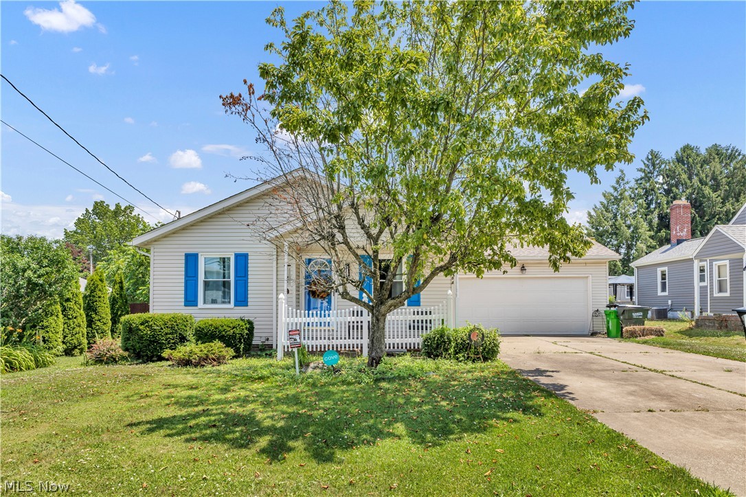 Welcome to this charming ranch home offering easy single-floor living in a highly convenient Massillon location. Built in 1998, this property features 2 comfortable bedrooms and 2 full bathrooms, paired with a highly functional layout that makes everyday living a breeze.  Inside, the home boasts a bright and welcoming living space featuring updated flooring and windows throughout. The kitchen opens up beautifully to a dining area with sliding glass doors that lead directly out to the backyard. For added space, the full basement is partially finished, providing space for a home office, recreation area, or gym, alongside plenty of storage.  Step outside to find a great space for privacy, gardening or outdoor activities. A paved driveway leads to a spacious, attached 2-car garage for easy parking and weather protection. Situated minutes away from local parks, shopping, schools, and everyday amenities.