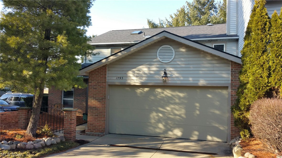 Stunning 3 bedroom (possible 4 bedroom currently being used as an office), 2.5 bathroom end unit located in private park-like setting. Gorgeous decor, large kitchen with breakfast bar, island, wet bar and solid surface counters. Two story great room with fireplace and tons of natural light. Spacious dining room steps down into a cozy heated sunroom and then out to a wonderful deck - perfect for entertaining! Wonderful master suite with private bathroom has jetted tub, stand up shower and walk in closet. Large second story laundry with additional walk in closet. Large loft overlooking the great room could make perfect office, craft area, playroom, etc. Two car (heated) attached garage.  Enjoy pool, clubhouse and tennis courts! This is a must see with the perfect location!