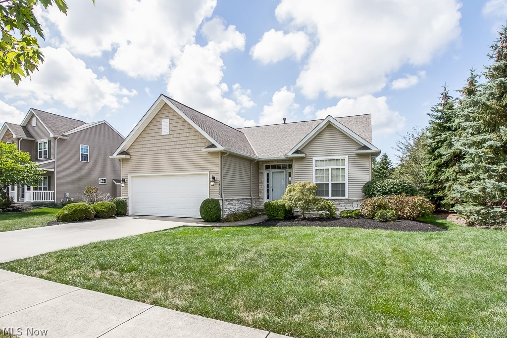 Don't miss out on this gorgeous ranch featuring an open floor plan the highly sought after Bridgeside community.  Beautiful real hardwood floors throughout kitchen and morning room. Brand new carpet everywhere else! Interior was also recently painted. Enjoy entertaining in the great room with plenty of natural sunlight, vaulted ceilings and the cozy gas fireplace that is perfect for the cool fall evenings!  Great room is open to the morning room and gourmet kitchen with plenty of counter-space, stainless steel appliances and custom raised breakfast bar.  All appliances stay!  Master bedroom features vaulted ceilings, enourmous walk-in closet and private bath with full glass door shower and dual vanity sinks. Two additional large bedrooms, one doubles as an office or bedroom and second full bath.  Convenient first floor laundry room between the kitchen and garage makes life easy! Downstairs the finished basement has brand new carpet with large recreation room with additional living spac