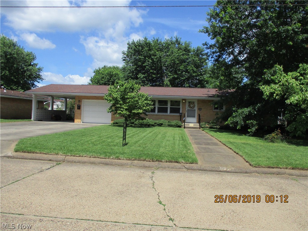 One floor living!  Well maintained starter/retirement home.  All brick, level fenced yard.  3 BR, 2 Baths, 1st floor laundry and large eat-in kitchen including all appliances.  Oversized garage and covered carport.  Large covered patio, ideal for entertaining.  Each bedroom offers a walk-in closet.  Convenient location.  Move-In Ready!