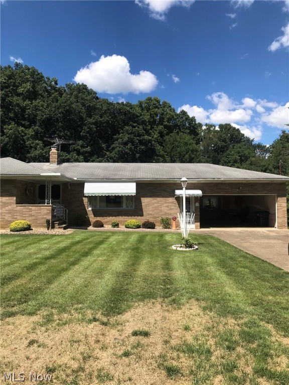 Remarkably kept 3 bedroom brick ranch on over three-quarters an are. Within the city limits of Barberton, Coventry Schools, and waiting for your offer. The basement has over 700 square feet of finished space, including a rec room and full kitchen. Enclosed four-season room, double car garage, French double door entry way, single floor living possible and a beautiful manicured lawn to top it all off. This rare and secluded find can be all yours and starts with an offer.