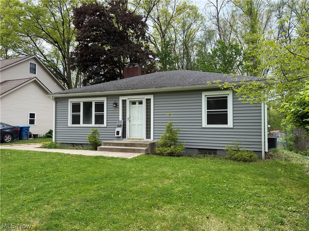 A rare opportunity to find a move-in ready home in the heart of Kent, with a .5 acre of wooded privacy. This ranch has everything you are looking for, with updates galore. You are welcomed by gleaming wood floors that flow throughout the main level. The large living room is centered by a gorgeous fireplace and flooded by natural light through the large wall of windows. The dining room flows from the living room to the kitchen, for perfect entertaining. The updated kitchen is stunning- with granite countertops, updated cabinets and newer appliances. The bedrooms have tons of light and good closet space, along with wood flooring and neutral paint color. The full bathroom is completely updated with plank flooring, modern vanity and updated tub surround. The house is filled with charming arches, built-ins and "Kent" characteristics. Your favorite spot in the house will be the enclosed sunroom in the back of the house, with a full view of the peace and serenity of the wooded backyard. In addition to everything already done for you in this home, the full basement is ready to be finished for an additional 1,000 square feet of living. You do not want to miss this home! Call TODAY for your private showing!