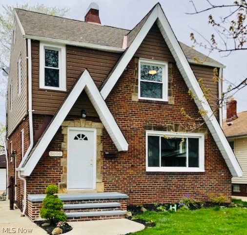Welcome to this Charming completely renovated Tudor that is conveniently located near shopping and dining. This home is like new with most of the updates being completed in 2020. This move-in ready home features 3 bedrooms, 2 full and 1 half bathrooms, 2 car garage, updated kitchen with granite counter tops and all new stainless steel appliances. Spacious living room features a fireplace, second floor features a spacious master bedroom with balcony and newly installed carpet. Finished basement has fireplace and full bathroom. Updates include: completely remodeled kitchen and bathrooms, replaced carpet and floors throughout, remodeled rec room in basement, new windows throughout and much more. The seller is including all kitchen appliances and washer/dryer. Make this your new home!