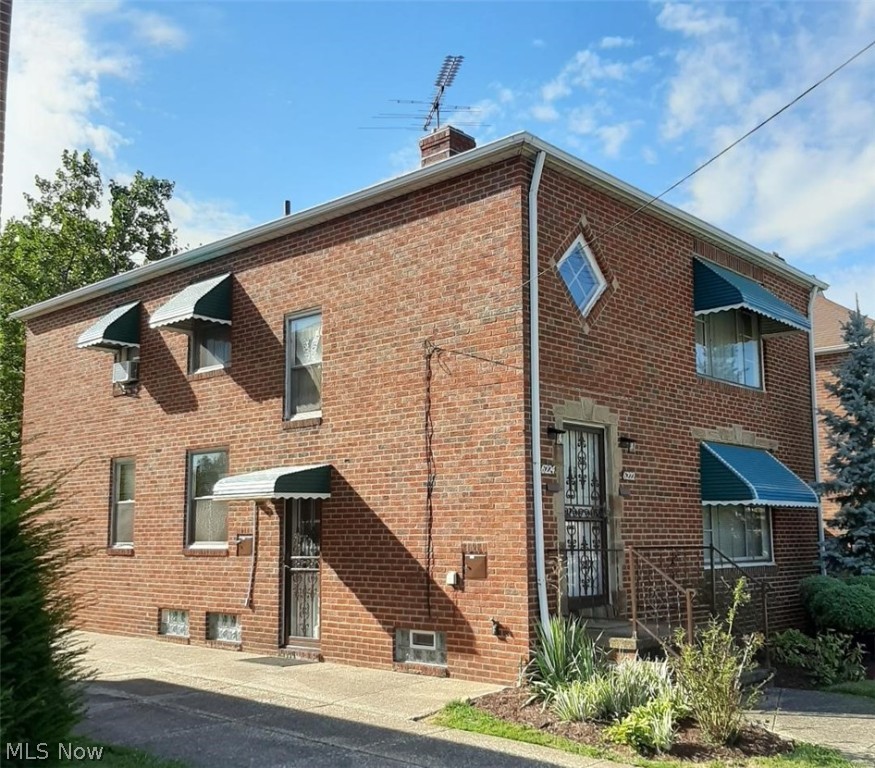 EXCELLENT Well Kept BRICK Two Family! Ready to move in or rent out,2 bedrooms each suite,enclosed back porches up & down,updated 100amp electric box,central air down unit,glass block windows,shed,2 car garage w/opener,nice area in backyard fenced