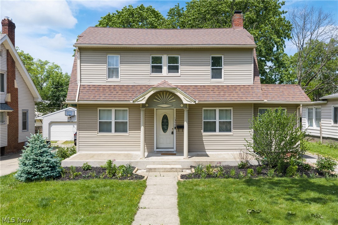 Perfect blend of old-world charm and modern updates in this desirable West Akron neighborhood! This spacious two-story colonial offers 4, possibly 5 bedrooms, 2.5 recently remodeled bathrooms, and a side-entry 2-car attached garage. A welcoming foyer leads to a dedicated formal dining room accented by beautiful natural woodwork throughout. The inviting living room features a fireplace enhanced with added brick and shiplap, while the sunroom offers flexible space as a home office or potential 5th bedroom. Nearly every major improvement has been completed within the last 5 years, making this home truly move-in ready. The fully remodeled kitchen features white cabinetry, granite countertops, tiled backsplash, added stainless steel dishwasher, and newer stainless steel refrigerator. New vinyl/LVT flooring runs throughout the home, complemented by fresh paint in every room. The first-floor half bath stands out with a hand-stained shiplap accent wall and unique vanity. Upstairs, the refinished wooden staircase leads to a spacious primary bedroom with vaulted ceilings, reconfigured to include a large walk-in closet with stylish barn doors. The remodeled en-suite bath offers ceramic tile, updated lighting, and a new vanity. Three additional bedrooms feature fresh paint and new flooring, along with a second fully remodeled bath complete with ceramic tile flooring, new vanity, and built-in hamper area. The basement includes a finished hallway, abundant storage, and ample space for future living areas, plus the peace of mind of a previously waterproofed basement. Additional updates include a high-efficiency furnace (2023), newly added central air (2023), hot water heater (2023), vented glass block windows, and an updated 150-amp electric panel. A charming, character-filled home with all the modern updates already done—nothing to do but move in and enjoy!