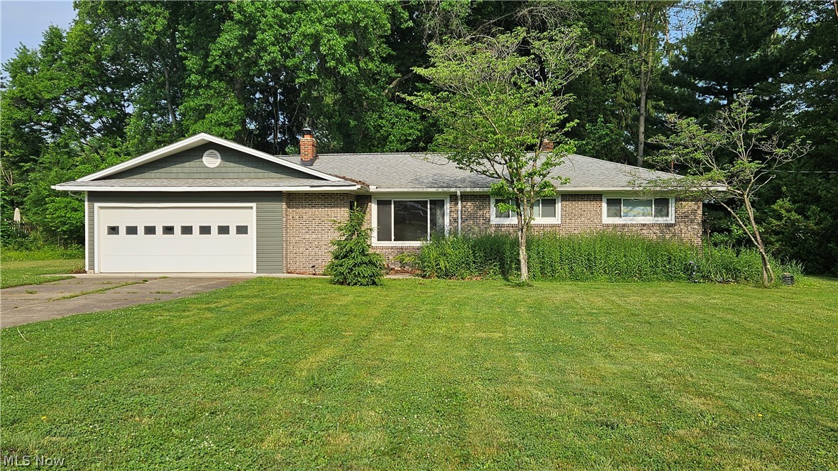 Incredible opportunity for investors, flippers, or buyers looking to create their dream home! Situated on a fantastic lot with exceptional backyard privacy, this brick-accented ranch offers tremendous upside and the chance to build instant equity. The exterior improvements have already been completed, including newer siding, roof, windows, exterior doors, allowing the next owner to focus on transforming the interior. The HVAC system has also been updated. The spacious living room features hardwood flooring and a stone-front wood-burning fireplace. A versatile bonus area off the garage could serve as a sitting room, mudroom, or convenient first-floor laundry space. The eat-in kitchen is ready for a complete reimagining and renovation. The main level offers three bedrooms with hardwood floors, a full bath, and a half bath. The large basement provides excellent potential, with one section partially finished and the remaining space ideal for storage, workshop space, or future expansion. This home offers great bones, major exterior updates, and endless possibilities for the right buyer willing to invest some vision and effort. Being sold strictly AS IS. Seller will make no repairs. Electrical and plumbing systems are incomplete and will require finishing. Due to the property's condition, financing will not be considered. CASH OFFERS ONLY. Don't miss this chance to unlock the potential of a well-located ranch with outstanding long-term value.