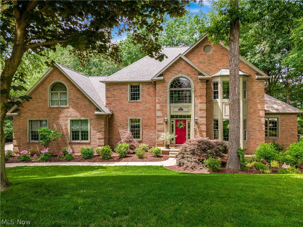 This mint condition all brick and well-loved Memmer built home is remarkable. There is so much detail and quality you have to see it. Over 5000 square feet of living space with old-world charm. The kitchen is a chef's dream with tons of storage, workspace, and high-end appliances. Off the kitchen is a 3 season screened porch that overlooks a park-like backyard with expansive decks and decorative ponds. The walk-out lower level adds great entertaining space and a sauna... this place is incredible!