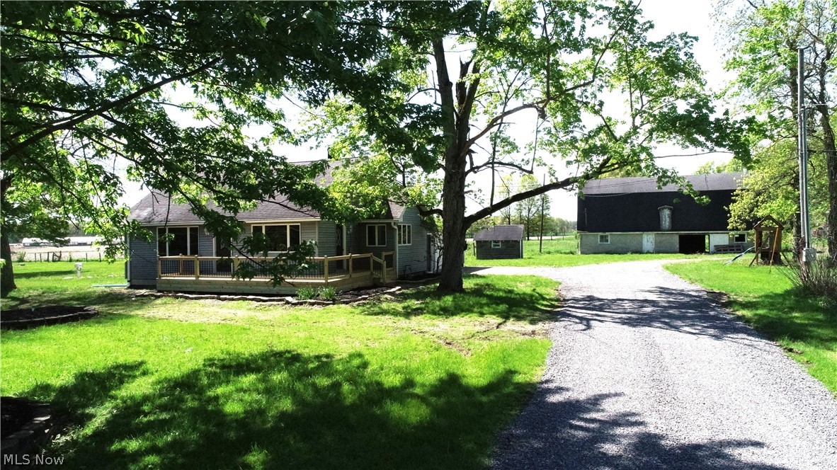 Charming 3-bedroom, 1 bath, cape cod on 5.1 acres, remodeled throughout, move in ready with immediate possession and free gas. Features include all newer flooring, updated bathroom, full basement, brand new deck overlooking a peaceful setting.  The property boasts two barns-one ideal for cattle or horses, other perfect for storing farm machinery.  This home has plenty of space inside and out, for combining country living with modern updates.