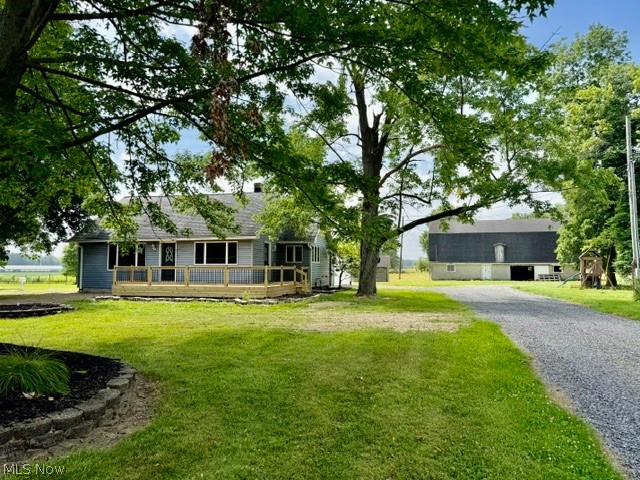 Charming 3-bedroom, 1 bath, cape cod on 5.1 acres, remodeled throughout, move in ready with immediate possession and free gas. Features include all newer flooring, updated bathroom, full basement, brand new deck overlooking a peaceful setting.  The property boasts two barns-one ideal for cattle or horses, other perfect for storing farm machinery.  This home has plenty of space inside and out, for combining country living with modern updates.
