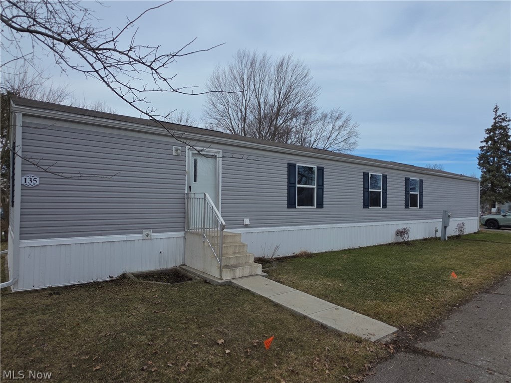 Discover comfort and convenience in this beautifully maintained manufactured home, located in the desirable West Ridge Green Mobile Home Community! Built in 2021, this 3 bedroom, 2 bath home features a bright open-concept with a spacious living room and large eat-in kitchen, with ALL appliances included! This residence also comes with an additional, transferrable home warranty that provides coverage to the property until February 25th 2027. The master suite includes its own private, full bathroom and walk in closet, while the two additional bedrooms provide plenty of space for family, guests or a home office. Outside you have a lot with room to relax and enjoy the peaceful surroundings, while located very close to the park main office and the mailboxes. West Ridge Green provides year round community activities and gatherings, basketball court, play ground, and pool! Conveniently located near all major highways in Lorain County, schedule an appointment to view this home today!