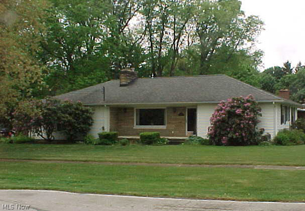 Ranch home situated on large corner lot. Beautiful remodeled oak kitchen with gas cooktop and wall oven.  Sunroom off kitchen with ceramic floor and newer energy efficient windows. Spacious living room with end wall fireplace. Newer 90 plus furnace and A/C in 2013, newer hot water tank. Basement features approx. 450 square feet of finished living area to include a Recreation Room with wood burning fireplace and extra room which can be Office or 3rd bedroom.  Full bathroom in basement with shower and tile. Extra storage area in basement and glass block windows. Roof approx. 6 years old. Landscaped yard with storage shed and underground invisible pet fence (does not include control unit). One year home warranty included.