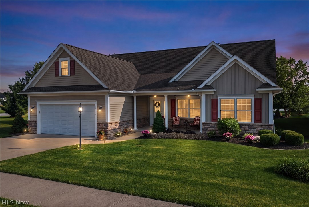 Enjoy low-maintenance living, picturesque pond views and Midview LSD in Mallards Edge, where golf cart paths connect directly to Mallard Creek and Bootleggers Bar/Grille. This move-in-ready 1.5-story home offers quality construction by Ron Palmer, including 2x6 exterior walls w cellulose insulation, Andersen 200 windows, and solid-core doors. An extended front porch welcomes guests to a modern open-concept living w new LVP flooring, spacious rooms and volume ceilings. The versatile flex room has endless possibilities to suit your needs. The oversized 17' x 20' vaulted great room impresses w a stone-faced fireplace and built-in entertainment unit. A cathedral ceiling spans the dining area and sunroom, creating an intimate light-filled space for gatherings. Your kitchen includes updates (granite countertops, sink/faucet, hardware), ample cabinetry w pullouts, an extended island w seating for five, and an external vented stainless-steel hood. A mudroom and a well-appointed laundry room w a sink, cabinets and drying space add everyday convenience. Offering scenic backyard views, your owner’s suite has a vaulted ceiling, WIC, and an ensuite w elongated dual vanities (one w makeup station) and a beautifully tiled walk-in shower. Down its own hall is a generously sized guest bedroom and a full bath. A spacious loft and finished bonus room provide ideal space for crafting, exercise, play and storage. Enjoy tranquil fountained pond views and stunning sunsets, your southwest-facing backyard features an open-air patio w gas line and a covered patio w ceiling fan. From hosting gatherings to sipping your morning coffee or relaxing after a long day, this tranquil backdrop offers an enviable escape. 3-car garage (third bay tandem) includes space for a golf cart, fully insulated, hot/cold water, and gas line for heater. UPDATES: whole-house generator, HVAC, hot water tank, LVP, granite counters, spindles! NO flood hazard! A trifecta of craftsmanship, comfort and lifestyle!