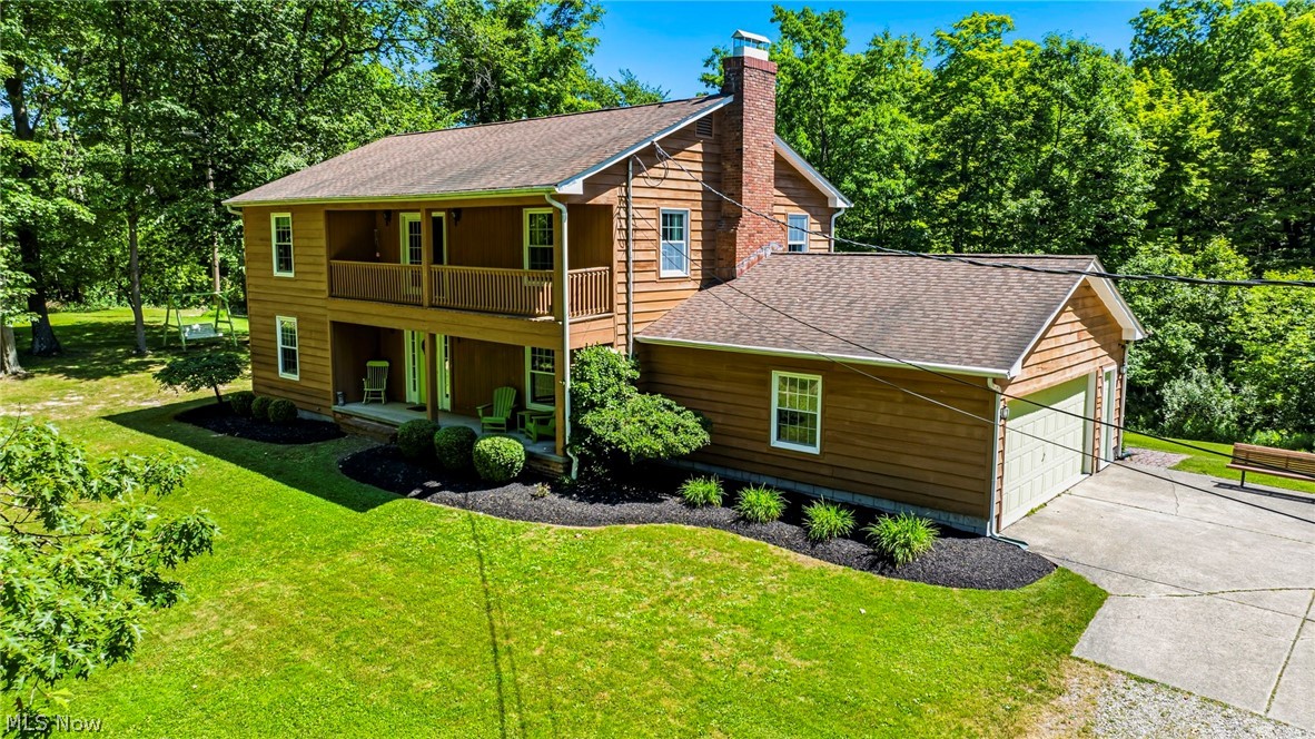 Welcome to 4008 Mannwood Road, a beautifully maintained Custom Country Colonial offering the perfect blend of privacy, comfort, character, and modern updates. Nestled on a picturesque wooded lot, this exceptional property provides a peaceful country feel while remaining conveniently close to shopping, dining, and everyday amenities.
The heart of the home is the beautifully remodeled kitchen featuring white cabinetry, granite countertops, updated appliances, abundant storage, and luxury vinyl flooring that flows seamlessly into the dining and living areas. The open layout creates an inviting space for everyday living, entertaining guests, and hosting holiday gatherings.
One of the home's most distinctive features is the custom pub-style family room. Complete with a tin ceiling, barn siding accent walls, a barn beam fireplace surround, mirrored shelving, and a bar area, this one-of-a-kind space is perfect for relaxing, watching the game, or gathering with family and friends.
Upstairs, you'll find generously sized bedrooms, updated bathrooms, ample closet space, and an impressive walk-in closet in the owner's suite. Additional improvements include updated fixtures, newer toilets, a recently replaced walk-in shower, and a washing machine less than one year old.
Outdoor living is equally impressive. Step outside onto the two-tier Trex deck with vinyl railings and hot tub, offering the ideal setting for grilling, entertaining, or simply enjoying the abundant wildlife and privacy this property provides. The inviting front porch and attractive landscaping create exceptional curb appeal and a warm welcome home.
With plentiful parking, abundant storage, and spaces designed for gathering, this home has comfortably hosted holidays, celebrations, and family visits for years. If you're searching for a property that combines modern updates, unique character, exceptional entertaining spaces, and a peaceful setting, 4008 Mannwood Road is ready to welcome its next owners.