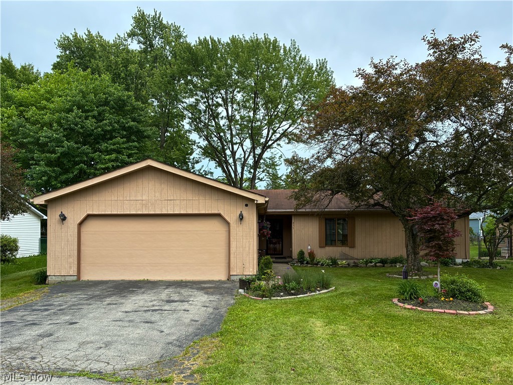 Spacious three-bedroom, two-bath ranch-style home situated on a large lot in a popular Niles neighborhood close to schools, shopping and recreation. Highlights include a living room with a cozy fireplace, dining room, primary bedroom with walk-in closet and attached bath, Florida room and attached two-car garage. Convenient single-story living at its best!