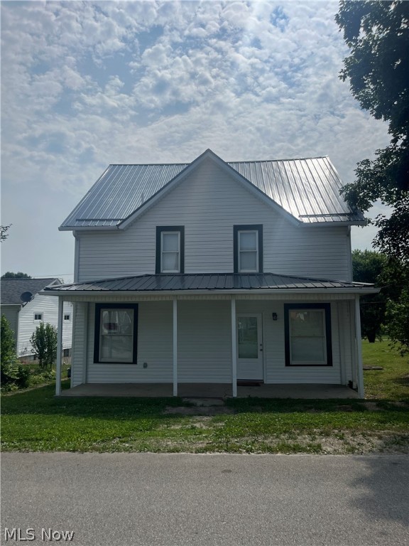 If you are looking for a home that is move in ready, completely remodeled, located in Rolling Hills School district, and that comes with brand new appliances...then look no further! Step into this newly renovated home located in Lore City. The outside of this two-story home has white vinyl siding and a new metal roof. The covered front porch allows you to enjoy your morning coffee on those warm summer mornings. Walking inside the front door on the main level; you will be greeted with laminate flooring and an open living room that connects to the dining room and kitchen. The spacious kitchen is completely remodeled with laminate counter tops, wooden cabinets, and kitchen appliances that stay with the home. Past the kitchen is the mud room with electric washer and dryer hookups as well as the 1 out of the 2 full bathrooms. Opening up the French doors in the mud room will lead to the new back porch overlooking the yard. Upstairs you will find new carpeting throughout the second level leading to all 3 bedrooms. The master bedroom has a walk-in closet with the second full bathroom attached to it.  This house is completely renovated with all new flooring, counter tops, bathtubs, toilets, sinks, electrical wiring, plumbing, hot water tank, furnace, and ac, giving it the new home feeling! This home won't last long; don't miss this opportunity! Call today to schedule a showing! 

*Agent related to Seller