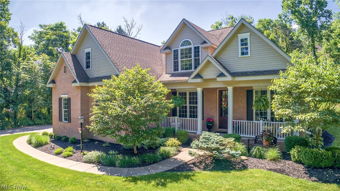Quality custom built classic cape cod located in one of the most desirable north end subdivisions. Features stately architectural design with its gables, dormers, high ceilings and abundance of natural light. Beautiful hardwood flooring throughout the first floor. Fully loaded gourmet chef's kitchen with custom cabinetry, Corian counters,  ceramic tile flooring, island, eat in breakfast area with views of the private back yard. The great room features cathedral ceilings, fireplace, and access to the rear patio. Perfect room to sit and relax while watching the outdoor activities or just the sunshine through the abundant extra large Florida windows. Formal dining room with nice flow from kitchen and large enough to host many dinner guests. The master suite has all the features you would expect from an executive style home. Exterior features include a curved sidewalk with professional manicured landscaping, brick trimmed front porch and 8'entry door to the foyer. All finishes completed wi