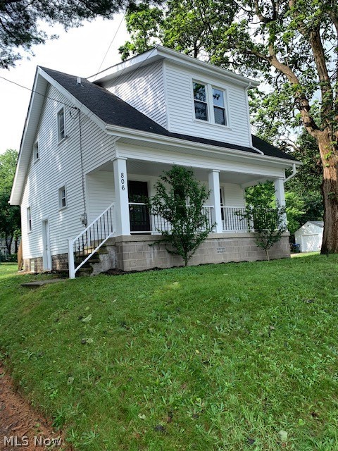 Are you ready to move into a home where nearly everything is brand new?  New Roof, New siding, New windows, New electric, New plumbing, New furnace, New AC, New flooring, New kitchen, New bathroom.... in other words, totally remodeled!!!  This beauty is beaming and ready for it's new owners!  The seller is adding an extra lot with this home to the side of the house in the event that the new owner would like to add a garage someday. The lot to the back of the house could be available as a separate purchase. The colors of the home are in the current styles and trends, and complemented with a stunning granite countertop. Gorgeous isn't even adequate enough for this counter!  The full front porch with black spindles adds to another layer of sophistication for the morning coffee breaks. You won't need a storage unit with the full unfinished basement ready for your shelving units! This home should give you many years of peace of mind since every mechanical system has been replaced. Come visi
