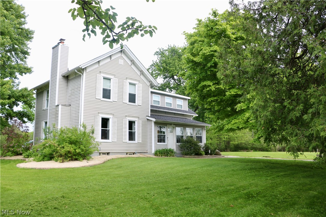 Welcome to 8463 Dewey Road in Montville Township—a charming and well-maintained 4-bedroom, 3 full bath home set on 2 scenic acres within the highly regarded Berkshire School District. Originally built in 1887, this property beautifully blends historic character with thoughtful modern updates completed during current ownership. The property offers exceptional outdoor amenities, including a stocked pond with an aeration system, a 12x24 shed (built in 2021), and a spacious 28x32 detached two-car garage equipped with electric, water, and gas line access—ideal for hobbyists or additional storage. Recent improvements provide peace of mind and added value, including newer lower roofs (2022), updated electrical service, a generator transfer switch, water softener system, septic inspection and servicing, and numerous landscaping and outdoor enhancements. The kitchen features granite countertops, adding both style and functionality. All appliances convey with the home, making this a truly move-in-ready opportunity. Enjoy the perfect balance of country living with modern conveniences in a picturesque setting.
