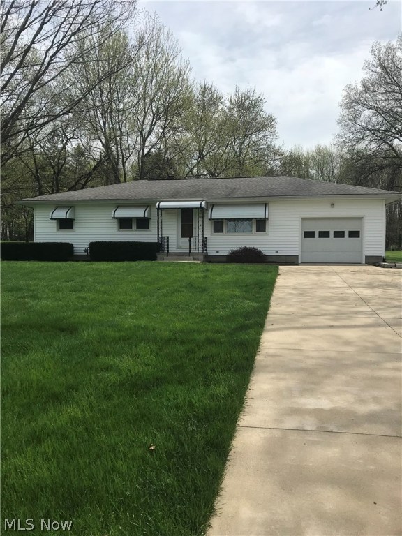 This home is extremely well maintained.  One owner home.  Beautiful back yard with an outbuilding reminisce of a doll house. Walk off your deck and enjoy the paved walkway around the back of the house.   Basement is dry and clean with workshop and lots of room for storage. This is one home you HAVE to see to believe.  Hurry, it won't last long.