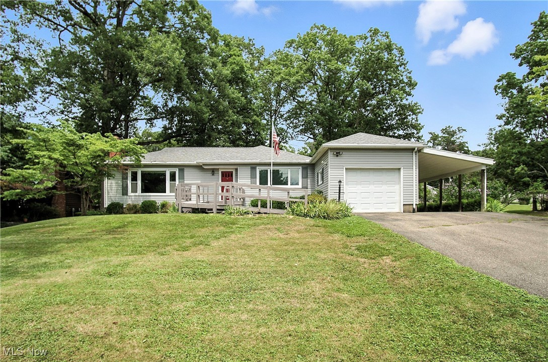 Discover this well-maintained home on Zanesville’s Northend—just minutes from shopping, hospitals, banks, restaurants, and more! This charming property offers 3 bedrooms, 1 bath, a 1-car attached garage, plus a 2-car carport for extra parking. You’ll love the beautiful hardwood floors throughout the hallway and bedrooms, and under the carpet in the living and dining rooms. Sitting on nearly half an acre (.49 acre), the yard has a park-like feel with mature trees providing plenty of shade—city living with a country atmosphere! Updates include newer roof, furnace, electric, replacement windows, and back gutter guards. The kitchen appliances, washer/dryer, storage shed, and even a pool table all stay, making this home truly move-in ready!  Immediate possession available at closing!