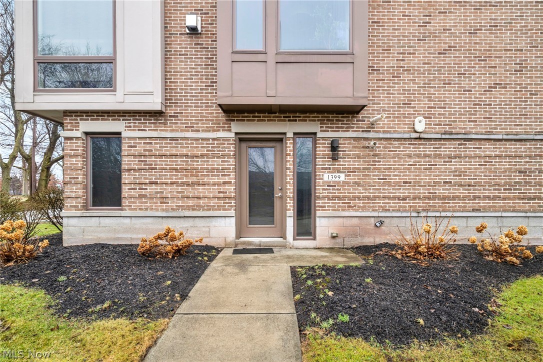 Modern, light-filled living across three thoughtfully designed levels at 1399 Slate Court in Cleveland Heights. This corner-unit townhome offers nearly 2,000 sq ft of open-concept living with 3 bedrooms, 3.5 baths, and a smart, flexible layout.
The main living level features bamboo hardwood floors, expansive windows, and seamless flow between the living, dining, and kitchen areas—ideal for everyday living and entertaining. The living room is highlighted by a gas fireplace with tile surround and granite mantel. The kitchen offers granite countertops, tile backsplash, stainless steel appliances, a center island, and access to a private balcony. A convenient half bath completes this level.

Upstairs are two spacious bedrooms, each with their own private full bath, with laundry located between them. The first-floor flex space works perfectly as a third bedroom, home office, or guest suite and includes its own full bath—making all three bedrooms en-suites.

Additional features include a 2-car attached garage, ample storage, and move-in-ready modern finishes throughout. Ideally located near shopping, dining, and entertainment. Schedule your private showing today.