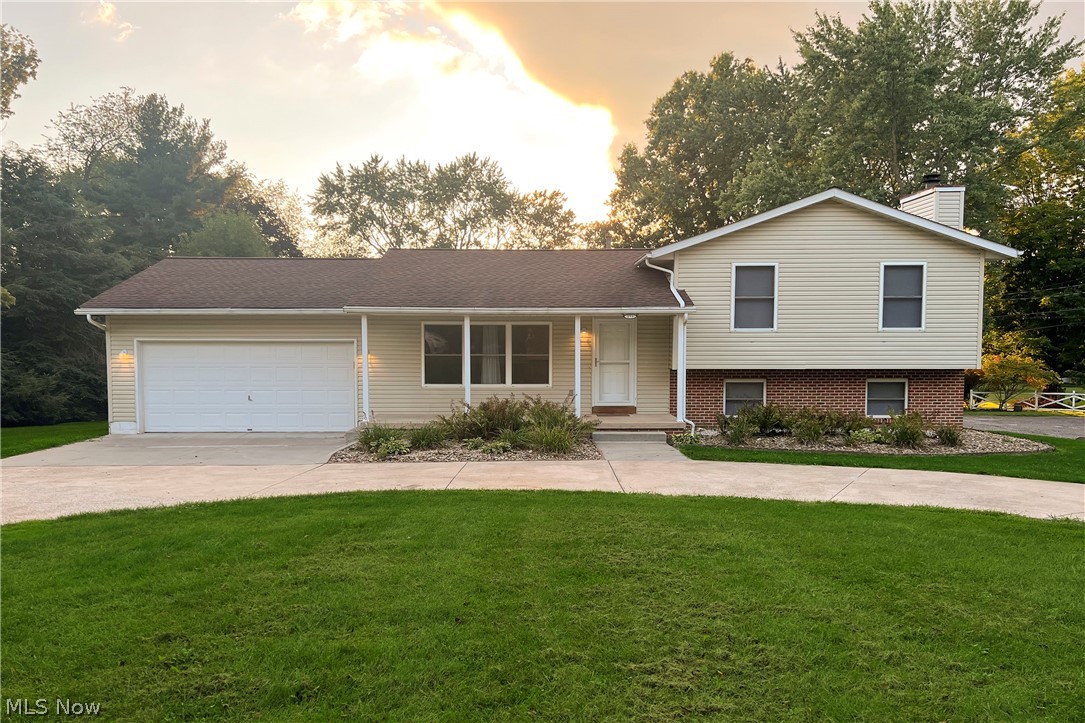 Beautiful split-level home in a quiet area close to Kent City Schools. Upon entering the front door, you are greeted with an open living room and dining room. Off of the dining room is a spacious solid oak kitchen with granite countertops and stainless steel appliances. This open concept is wonderful for entertaining! Off of the living room to the lower level you will find another Family Room complete with a decorative fireplace, access to the basement and an additional bedroom or a home office area. The bedroom on the lower level has a half bath and its own private entrance from the outside. The basement has ample storage space with washer and dryer hookups. Up on the second level, you will find 2 full bathrooms and 3 bedrooms. The primary bedroom upstairs offers a nice sized room with its own personal bathroom. In the back of the house you will find a gigantic two level deck perfect for entertaining! Off of the deck contains a 10x10 clubhouse perfect for extra outdoor storage as well as,  additional parking space! Don't miss out on this beautiful home! Tenant responsible for all utilities and landscaping/snow removal. All adult applicants must apply online. $50 nonrefundable application fee per adult applicant. Pets allowed with a double security deposit.