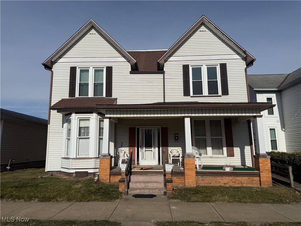 Spacious 5 bed, 1.5 bath home with over 2700 sq ft of living area. The main floor features a large bedroom, half bath, and a laundry room with a shower.