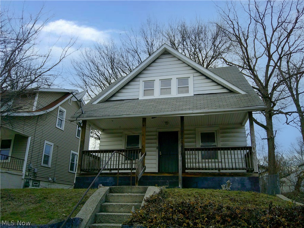 This Colonial-style home features classic architecture and a functional layout. With good bones and untapped potential, it offers an opportunity for those seeking character and possibility. This three-bedroom, one-bath home presents an investment opportunity for those seeking to create value through renovation. The property features a welcoming front porch and full basement providing storage space. The dining room includes a bay window and a built-in China cabinet. The property is sold in AS-IS condition. Buyer to verify all information. Buyer or Buyer's Agent responsible to check with Building, Zoning, EPA, DEA, Tax Department or any other requirement for intended use. Subject to clear title.