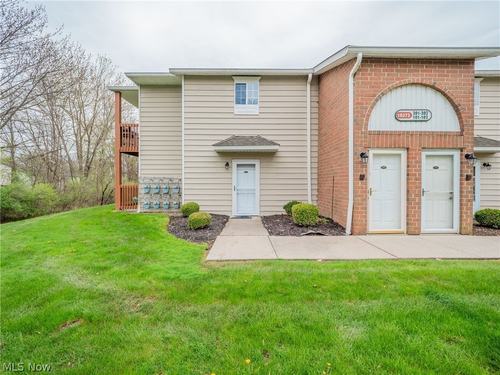 This is one of the best units at Liberty Pointe. This first floor end unit is located next to the pond on the backside of the building, offering peaceful wooded and water views from the windows and the covered porch. Step inside through your private unit entrance into a large 2 bed, 2 full bath condo on the ground level. You will notice all of the flooring has been updated throughout. The kitchen is large and has plenty of extra space for a kitchen table or more work or storage space. The living and dining area creates a large open feeling and has a glass sliding door leading to the porch and looking into the woods. Down the hall there are 2 bedrooms and 2 full baths and a full size laundry room as well. The parking lot is ample for Liberty Pointe and there are garage spaces that are able to be lease for $40 a month when available.