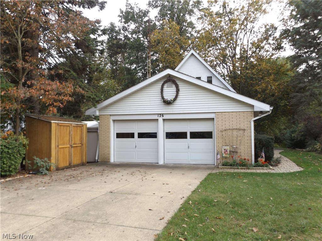 Willowdale Lake.  Take advantage of a rare opportunity to have an affordable lakefront home in Jackson township.  With your own dock (trex decking floor)  Paddleboat, canoe ,and fishing boat stay. Cruise into the main lake and visit the clubhouse.  Enjoy true community, recreational activities and clubs.  These owners of 38 years have a beautiful double lot with 6 apple trees, and gorgeous larger trees for shade.  A very private oasis of nature and a bird lovers paradise (birdhouses stay) Spruce is on a cul-de-sac with only resident traffic.  2.5 car garage, extra driveway parking, and plenty of cabinets and storage. Attic storage space. Two sheds. Solid brick 1960's built home with a newer roof (2015) Home warranty.  The upstairs loft bedroom is accessed with a spiral staircase. Be sure to open the lighted closets to see the built in cedar drawers and storage units, and enjoy the view! The first floor offers a living room with fireplace, and boosts large windows. The full bath with tu