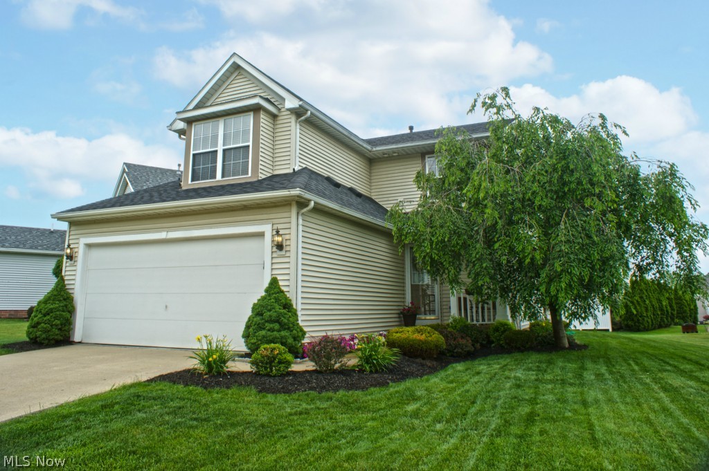 This PRISTINE 3 bedroom, 2 1/2 bath home located in the desirable Coventry Crossings development has been completely updated! The spacious and open floor plan offers 1421 square feet of living space PLUS an additional 625 square feet of finished space in the lower level. The  finished lower level is perfect for a TV room, work out room or a spare bedroom for guests. This home has been completely repainted with neutral, warm colors and all of the lighting has been replaced with modern, attractive fixtures. The spacious kitchen has been updated with beautiful new stainless steel appliances in 2015 and comes complete with a transferable warranty. The master bedroom features a vaulted ceiling for a spacious feel and the master bath has been updated with new tile and lighting/plumbing fixtures to give it an updated look. The roof was replaced in 8/2013! Family room, stairs and hall carpet were replaced in 5/2014. H20 new in 2009. A/C condenser and board new in 2014/2015. New blinds througho