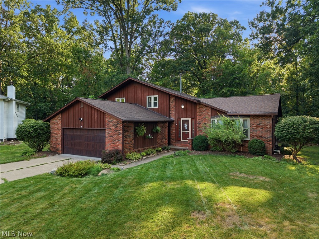Welcome to 1148 Krndia Ct, a beautifully updated split-level nestled on a private, wooded, pie-shaped lot in a peaceful Brunswick cul-de-sac! This spacious 4-bedroom, 3-bath home offers 3,195 total square feet of thoughtfully renovated living space in the sought-after Old Mill community.

The completely remodeled kitchen shines with white cabinetry, granite countertops, a large center island, and stainless appliances — perfect for everyday living and entertaining alike. Vaulted ceilings and a striking stone accent wall bring warmth and character to the living room, while the finished lower level offers a versatile family room with a cozy fireplace, wet bar, and endless flex-space potential.

Retreat to the primary suite on the third level, or take advantage of the main-level bedroom for guests or multigenerational living. Enjoy your morning coffee or evening unwind under the covered deck overlooking the private, tree-lined backyard — true forest views right from your own home.

Additional highlights include an attached 2-car garage, main-level laundry, and community amenities including a pool and fishing access. All this in the desirable Brunswick City School District, just minutes from shopping, dining, and easy highway access.

Move-in ready and packed with updates — this one won't last! Schedule your private showing today.