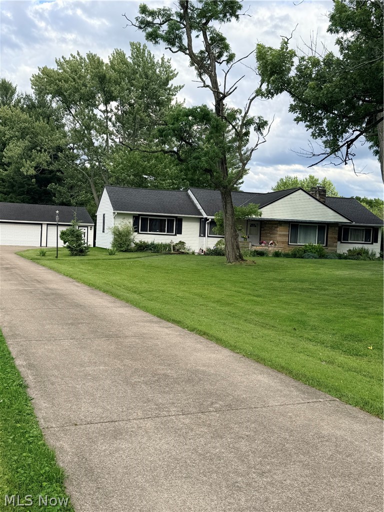 A rare find!!  Spacious and updated desirable Strongsville ranch on 1.6 acres!!  Close to highways and all amenities Strongsville has to offer, this property features 3 generous bedrooms and 3 bathrooms.  The living room features newer wood flooring and stone, wood burning fireplace with new Quadra-fire high efficiency insert!  Kitchen has been completely updated and expanded recently with new cabinets, granite counters, new plumbing, and new stainless appliances!  The master bedroom features his and hers closets and a full bath!  Two additional nice sized bedrooms complete the first floor!  The upper level features newer flooring throughout!  There is additional living space in the lower level with nature stone throughout, wood burning fireplace (used every year and in good working condition), new boiler system 2016, newly added whole house A/C in 2018, new HWT 2026, and complete interior AND exterior waterproofing in 2018!  Windows in 2017 and newer doors!  The park-like setting of the exterior and yard is sure to please!  There is a 1.5 attached garage and a 3.5 detached garage in the private yard.  The recently fenced 1000 sq foot portion features a gazebo and serene privacy!  The fence is 100 x 100, and outside of the fence, there is plenty more yard!  Must see to appreciate! Gutter guards installed and trees recently trimmed!  This property is a must see!  All appliances stay, including washer and dryer!  Make your appointment today before it is gone!