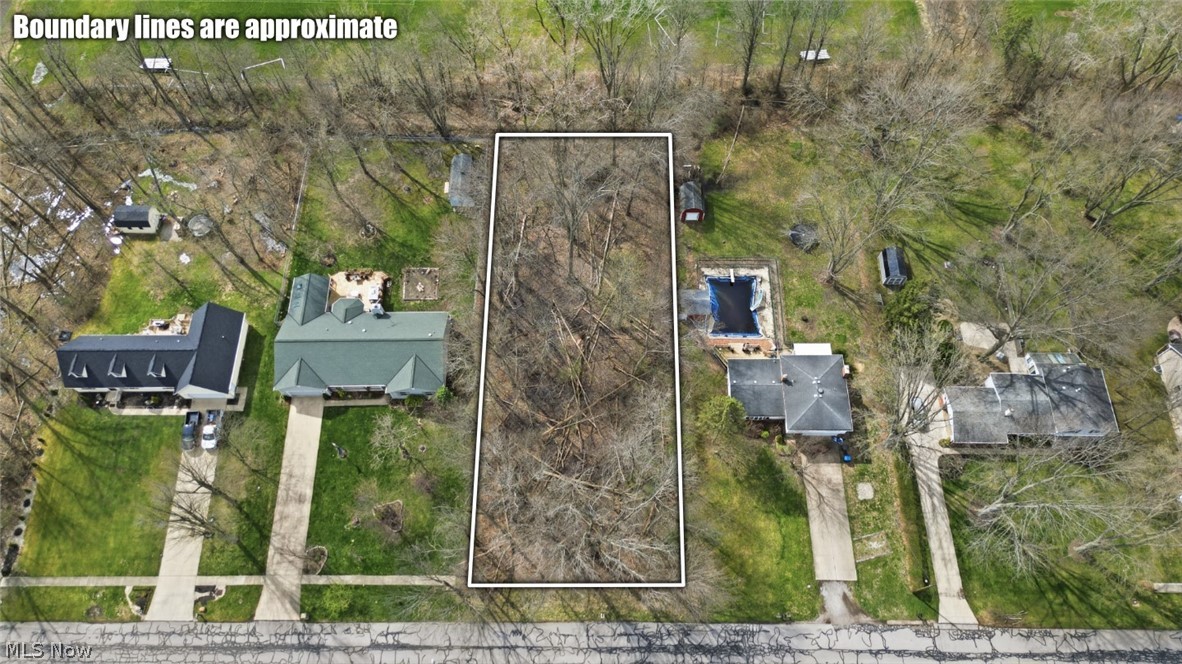 Buildable residential lot located within the French Creek watershed and FEMA-designated 100-year floodplain. Engineering review confirms that the prior proposed fill does not increase flood elevations (no-rise certification completed). The property may qualify for a riparian setback waiver due to its size and longstanding configuration.

Development is feasible but will require additional due diligence and approvals, including wetland delineation, soil testing, revisions to the grading plan, and stormwater management (SWP3). Buyers should anticipate coordination with the City of Avon and compliance with floodplain development regulations.

Options for construction include a slab home (simpler approval process) or basement construction with additional engineering requirements and elevation standards. No compensatory storage is required due to parcel size.

Ideal opportunity for a buyer or builder familiar with floodplain development seeking a custom home site with engineering groundwork already initiated.