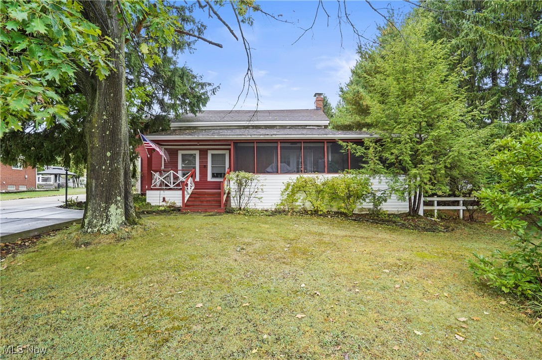10290 Abbey Rd North Royalton OH 44133 is a gorgeous Century home with 2,142 sq ft including 4 bedrooms, 2 full bathrooms, gorgeous remodeled kitchen with stunning Dining Room looking into the Large Living Room,  24' x 48' traditional pole barn with Loft on large .675 acre lot ! Originally Built in 1853, this gorgeous home was renovated with an effective date of 1962 and then this owner has owned the property since 1986 and lovingly remodeled the entire home as well as added a gorgeous Primary Bedroom Suite & bathroom on the 2nd floor & the Beautiful Mudroom Entry & full bath on the 1st floor therefore expanding the total square footage to the current 2,142s.f. w/ 122' of frontage & 241' deep flat & serene land with public water & sewer services in a wonderful school district of North Royalton. This is the perfect mix of Farm House Chic & Modern Amenities. 1st floor Bedroom & Full Bath make this a great multigenerational living home w/ 3 additional 2nd floor bedrooms & full bath with an awesome Sitting Room to use for hobbies, play or quiet space.  The inviting front screened sitting porch & concrete driveway, added w/in past 3 years compliment the exterior as well as the red barn color home siding & rear stamped concrete patio. Additional items updated from this homeowner is the 2014 furnace, converted wood fireplace to gas logs fireplace, kitchen, bathroom, added a bathroom, added a mudroom, & primary bedroom, windows, hot water tank, lots of concrete driveway parking, roof, pole building, additional electric panel, & much more like exposing some of the original timbers, vaulted ceilings, paint throughout have made this a gorgeous home that you'd also be proud to own! This listing includes a one year home warranty paid by the Sellers at closing for your peace of mind in ownership. The proximity to highways for travel and restaurants, shops and schools is awesome! So do not miss this opportunity, call your favorite real estate professional, come see for yourself!