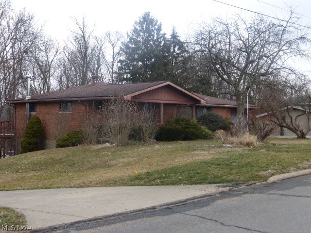 Lovely brick ranch home on nearly 1 acre lot in Edgeworth Addition offering brick exterior, attached garage, partially finished basement, 3 bedrooms, large living room, nice kitchen with lots of cabinet space, 2 full baths, paved drive, beautiful inground pool and a great location convenient to city park, schools and local hospital.