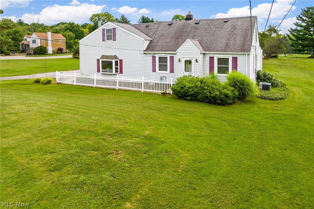 Let yourself be amazed by this 3 acre property this 5 bedroom, 2 full bath home sits on. Freshly painted rooms and new carpet. The laundry room is adjacent to the kitchen. In the family room you'll find a fireplace and stairs to a very large bedroom that can share a large walk in closet with the master if you choose. It's move in ready and improvements can be done once you're enjoying your beautiful yard. There is an extremely large deck from which you can enjoy your 27' above ground pool. The house boasts a very large 3 car garage with an upper floor workshop or storage area. Behind that is a 12x16 shed. As you retreat to your backyard a full sized 50x80 lined basketball court greets you that could be changed to a tennis or pickleball court if you desire. As you walk further a very serene pond captures your senses. This home is being sold in its as is condition. Explore the possibilities!