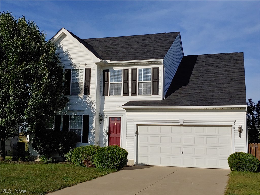 Move right into this four bedroom, two and one half bath, open concept colonial in Heisley Park.  This home features hardwood flooring in the foyer, living room with a gas fireplace and an eat-in kitchen with stainless steel appliances included.  Walk out your kitchen through the sliding door to a spacious deck.   First floor laundry.  Master bedroom has laminate flooring with attached master bath and walk-in closet.  Three more bedrooms and a full bath finish off the second floor.  Partially finished basement contains a recreational room for the kids or your hobbies.  Basement has plenty of space for storage and the sump pump has a battery backup.  Two car attached garage.  Home comes with a 1 year Home Warranty, so buy with confidence.