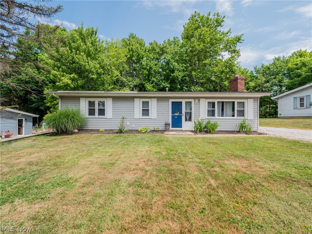 This lovely and spacious ranch on a quiet street is ready for a new owner! This move in ready home is conveniently located in Twinsburg near parks, trails, playgrounds, highways and award-winning schools. Upon entering the front door, you are welcomed to a spacious family room with vaulted ceilings, plenty of windows for natural lighting and a fireplace. The eat-in kitchen has plenty of countertop space, newer cabinetry, clean appliances that all stay with the home and a sliding door for access to the back yard. Three good sized bedrooms, a full bath and a laundry room (washer/dryer stay) round out all this charming home as to offer. Partially fenced in yard, 2 car detached garage with electric opener and nice deck make this home desirable for any new owner. Updates include whole house paint (2018), laundry room (2018) and new HVAC (2020). Book your appointment today!