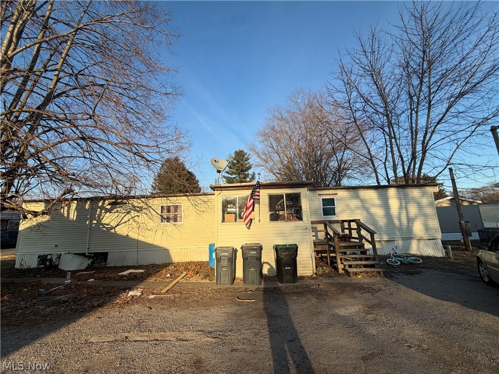 1981 Single Wide Mobile home-Rented -$850 with 1 car garage on city lot with public utilities. Extra trailer pad for rental income, currently rented for $175/monthly.