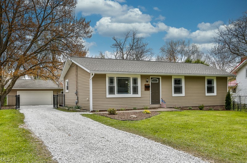 Welcome home to this gorgeously remodeled ranch style home in convenient Stow location! Walking into the front door you are greeted
with loads of natural light while stepping into the homes foyer area and living room with large picture window. Off the foyer is the
dining area that is completely open to the homes updated kitchen that features bamboo flooring, bright white cabinets, granite counter
tops a fabulous pantry and Frigidaire stainless steel appliances that all stay! Off the homes main hallway are the 3 nicely sized bedrooms
each with a spacious closet and newer carpet and paint. The master bedroom connects directly to the 1st floor full bathroom with
ceramic tile flooring/ shower surround and new modern shelving flanking the extra wide vanity. The finished lower level will give you
that extra space you are looking for! The over-sized rec room gives you space to spread out, the bonus room could be an office, craft
room, bedroom, the possibilities are endless! The second