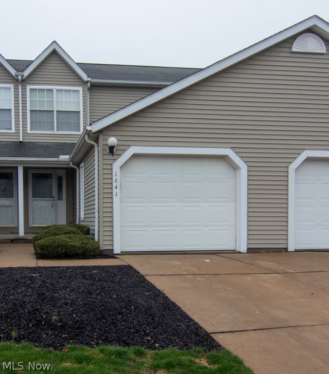Looking for a move in ready place to call home?  This is it!  2 Bedroom, 2.5 bath with full basement!  This well maintained home features updated lighting, freshly painted and brand new carpeting!  An open floor plan on 1st floor and both bedrooms have cathedral ceilings and large closets.  Make your appointment today to call this home yours!