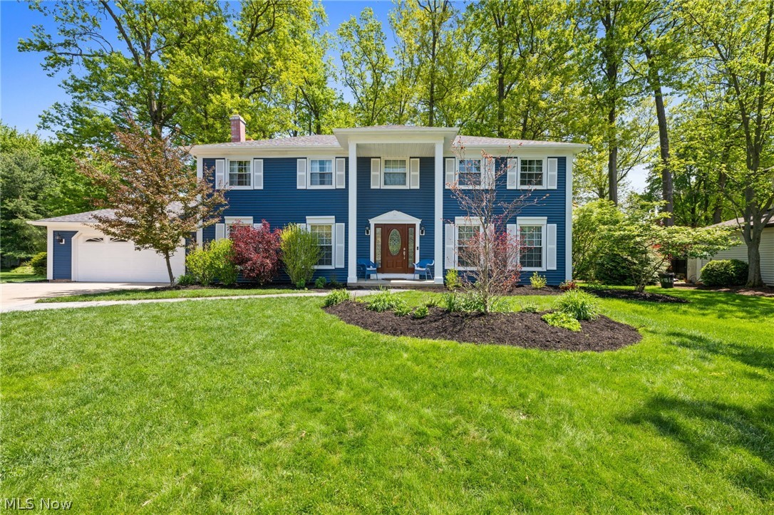 Stunning Colonial on beautiful Cul de sac street! Newer tear down roof, vinyl siding, windows, luxury wood vinyl flooring on first floor, and newer carpeting upstairs. Kitchen and baths recently updated in contemporary decor!  Coffered ceilings in kitchen and family room overlooking stone wood burning fireplace.  Bay window in the family room overlooks the hummingbird/butterfly garden and spectacular fenced-in treed lot!  Lots of upgrades: beamed ceiling with built in bookcases in first floor office, crown molding and chair rails in kitchen and family room.  2 story foyer with large brass chandelier.  Master bedroom has a fireplace that can easily be converted to gas or electric.   Custom closet organizers in all bedrooms.  Finished rec room and basement with lots of storage space. 

Recent updates include the following: 2026: Updated electrical panel, Epoxy garage floor treatment with silver specks. Updated front and rear landscaping.
2025: New front door, new interior and rear garage steel doors, new copper like mailbox.  New laundry room ceramic tile.
2024: new vinyl siding, shutters, exterior lights, new tear down roof, updated bathrooms-enlarged master bath shower, new tub and tile in secondary bathroom.  Updated kitchen with granite countertops and backsplash.  Replaced flooring on 1st and 2nd floors.
2023: Custom closet organizers in all bedrooms.
2021: Painted interior top to bottom including ceilings and interior garage.
2020: Installed new replacement windows and 2 sliding patio doors. Created bow window in family room overlooking hummingbird/butterfly garden.
2019: Replaced hot water tank with large capacity tank, installed UV light treatment with furnace to kill viruses, Leaf guard gutters with lifetime warranty, new roof venting.
2016: Stamped concrete entranceway, expanded driveway to accommodate 3 cars
2013: Replaced with Lennox Furnace and air conditioning unit.   A few minutes to Crocker Park and the I 90 freeway!